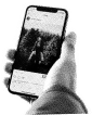 A hand holding a smart phone